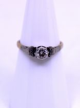 Unmarked Yellow and White Metal approx. 0.20ct Solitaire Round Brilliant Cut Diamond Ring. The 0.