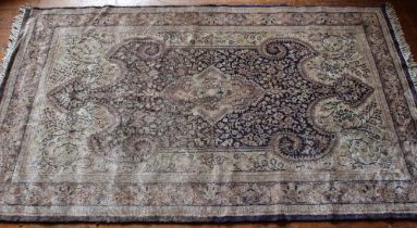 A silk hand-knotted rug purchased in the Far East, slight wear/repairs to edges, approximately 123cm