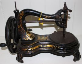 A Jones hand sewing machine c1890 with gilt decoration, 36cm wide condition: gilt rubbed