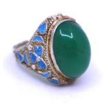 Unmarked White Metal Chrysoprase and Enamelled Ring.  The Green Oval Cabochon Chyrsoprase measures