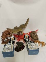 A collection of miscellaneous mostly animal related figures to include; large brass eagle,