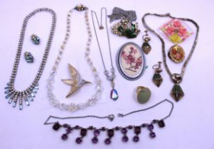 A selection of Vintage and Modern Costume Jewellery.  To include Necklaces, Brooches, Earrings and a