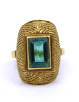 Green Tourmaline ring (No hallmark but tests as 22ct gold-the setting of the ring). A domed and