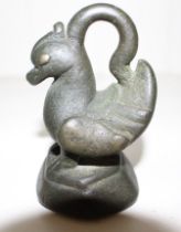 A large Burmese bronze opium weight in the form of a stylised bird, 9cm high