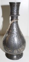 An Indian silver bidri ware vase of baluster shape. 24cm high