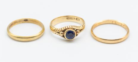 Three 14ct Gold Rings.  To include a 14ct Gold Round Brilliant Cut Sapphire Ring and two 14ct Gold