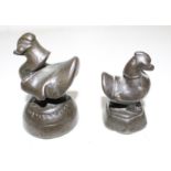 Two Burmese bronze opium weights in sizes, tallest 6.5cm high