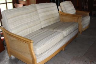 Ercol wood and cane framed Bergere style suite, this is overall very good condition but fabric
