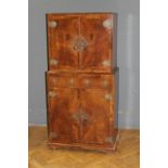 A French style walnut cocktail cabinet, by M&T London LTD, the crossbanded doors with heavy brass