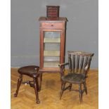 An Edwardian mahogany strung and crossbanded vitrine, glazed to all sides, with a frieze drawer