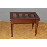 An Edwardian mahogany luggage stand with slatted top, raised on ring turned supports. 48 x 66 x