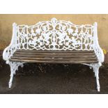 A Victorian Coalbrookedale cast iron garden bench, decorated with trailing fruiting vine and leaves,