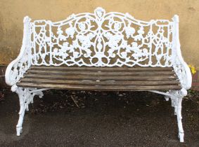 A Victorian Coalbrookedale cast iron garden bench, decorated with trailing fruiting vine and leaves,