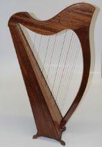 A Morley type thirty two string Celtic table harp. 102cm