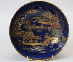 A circa 1921-1926 Carlton Ware Chinoiserie Blue Barge pattern lustre ware bowl of good size.