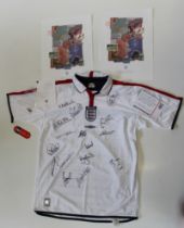 A signed 2003 England football shirt, with sixteen signatures, including David Beckham, Michael