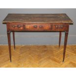 A George III elm plank top table, fitted three frieze drawers with brass swan neck drop handles,