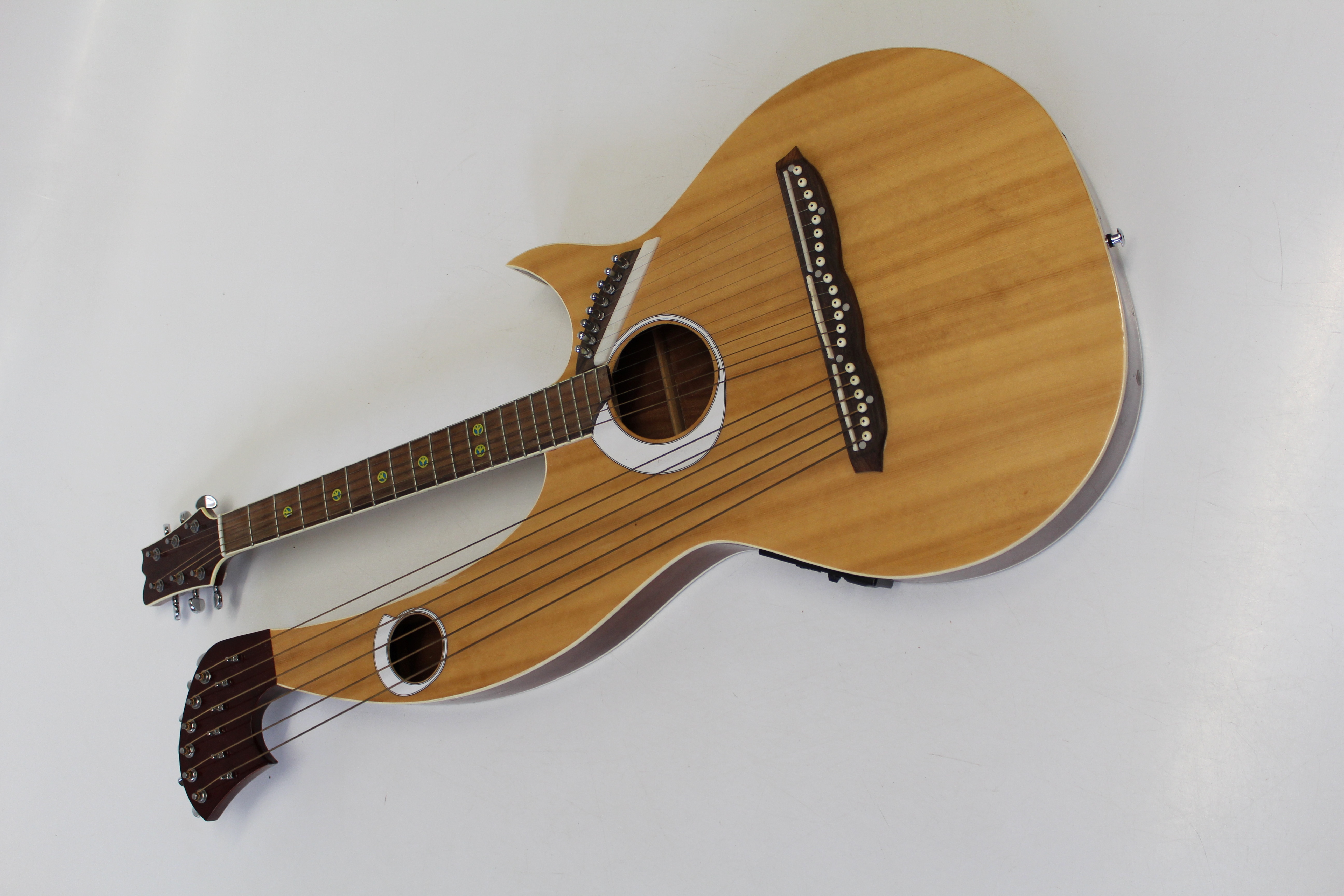 A circa 1970's twenty string harp guitar. 107cm