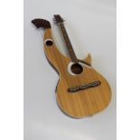 A circa 1970's twenty string harp guitar. 107cm