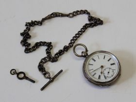 A silver open-faced pocket watch, with engine turned decoration, the white enamel dial with Roman