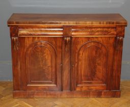 A Victorian mahogany chiffonier, fitted two frieze drawers over a pair of cupboard doors, on plinth