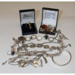 A collection of sterling silver jewellery and 925 marked jewellery. TO include rings, amber set