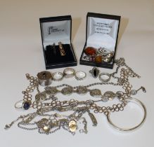 A collection of sterling silver jewellery and 925 marked jewellery. TO include rings, amber set