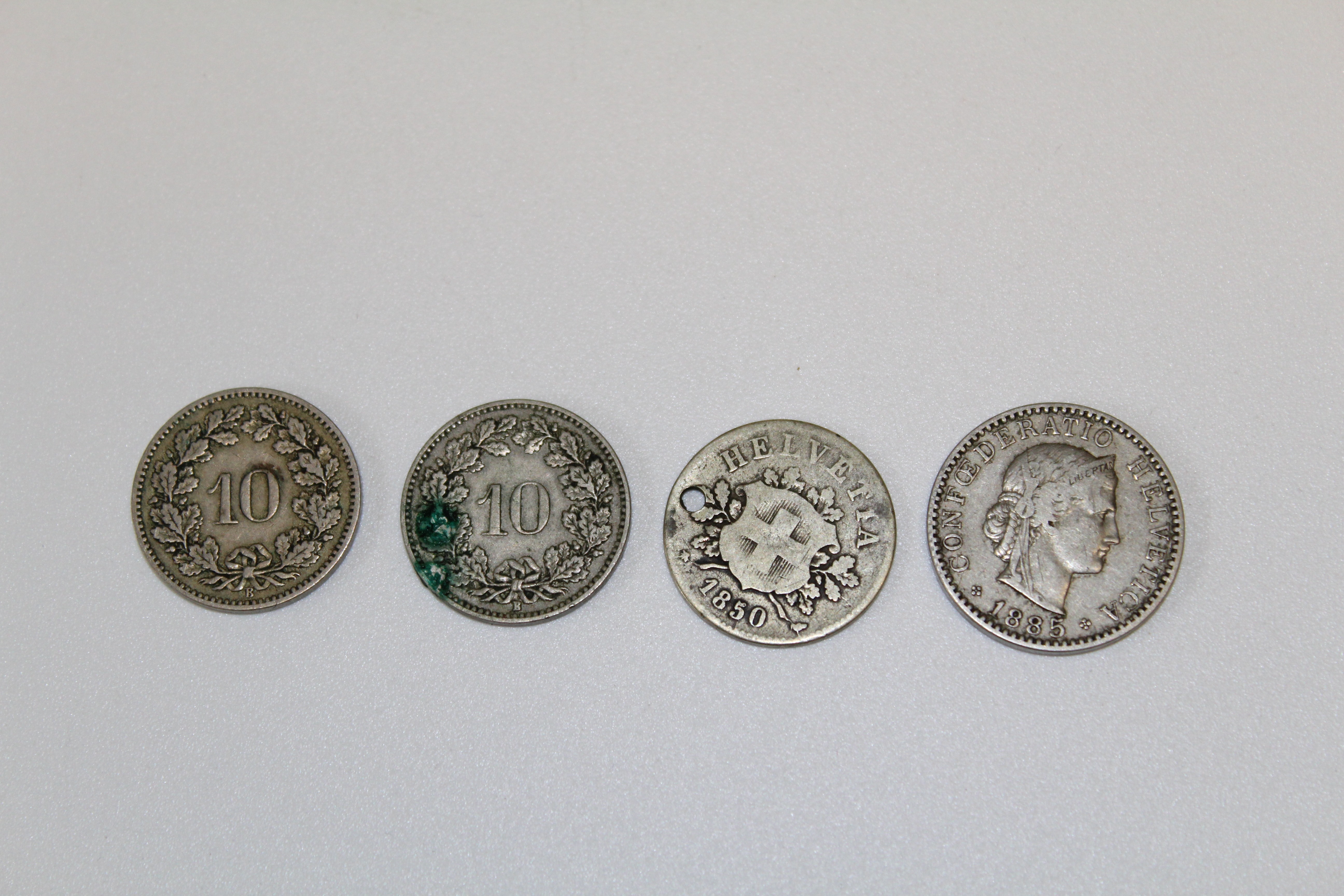 Four Swiss coins 1885 10- Helvetica 1885 20 Helvetica 1903 10 Helvetica 1850 10 Helvetica