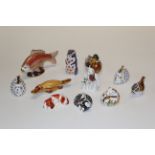 A collection of Royal Crown Derby paperweights, eight with gold stoppers, platypus, chipmunk,