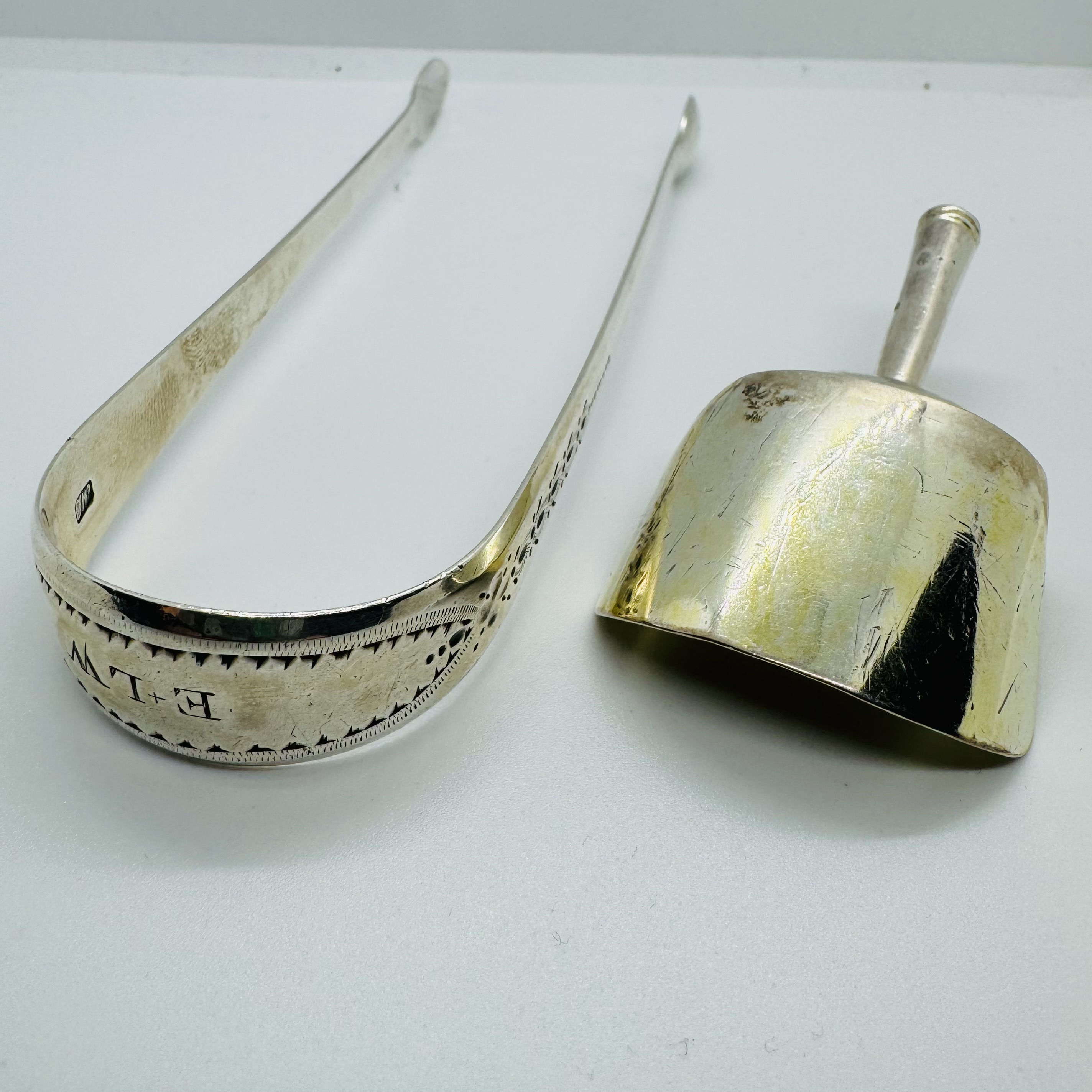 George III tea silver comprising a shovel caddy spoon along with a set of sugar tongs. The caddy - Image 2 of 2