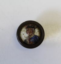 An early 19th century enamel patchbox, decorated with a portrait of an unknown naval officer 2.1cm