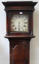 An oak longcase clock having a thirty hour movement and a later square dial within a typical case,
