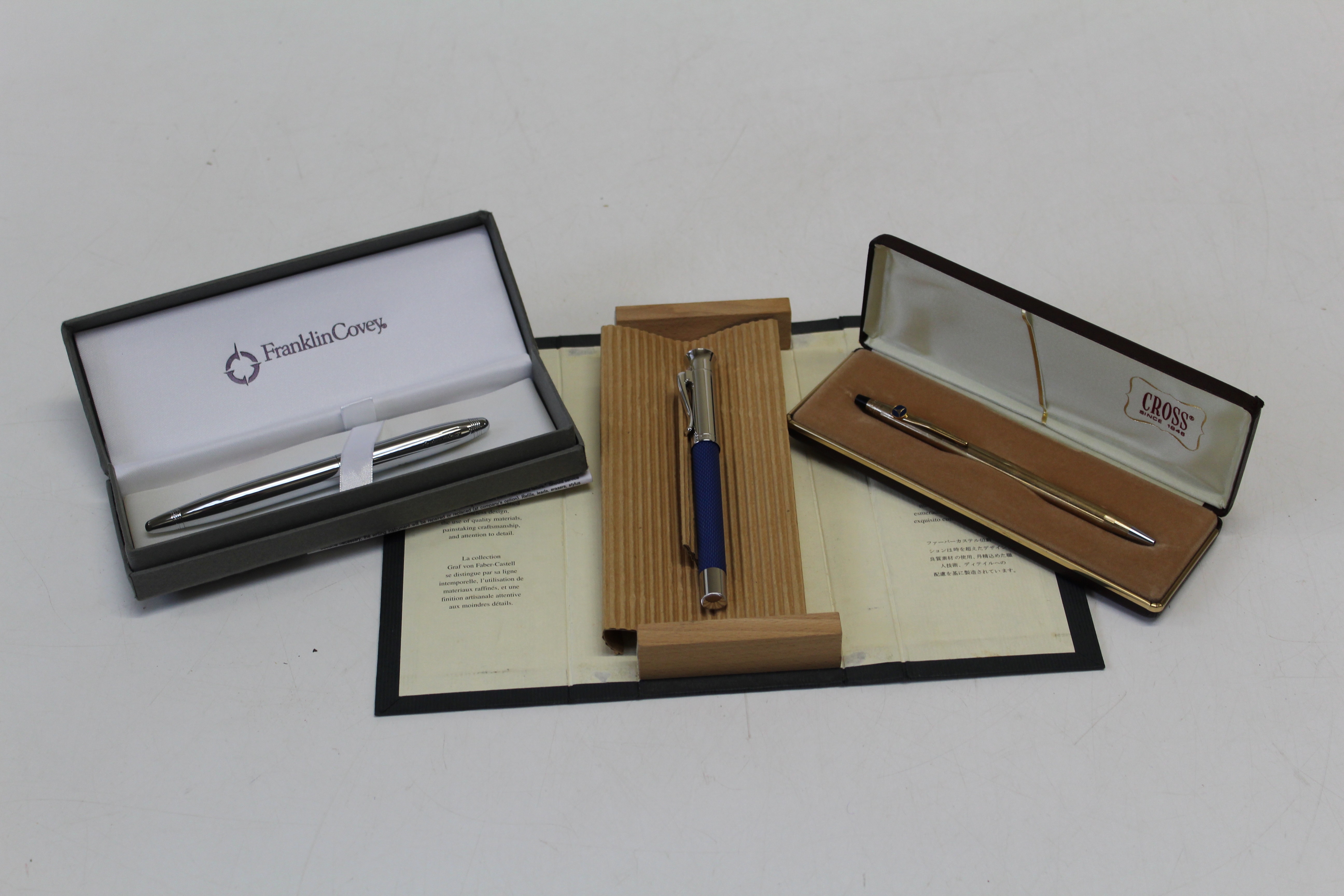 A Graf von Faber- Castell 18k nibbed fountain pen with white metal lid. Along with a cross ball