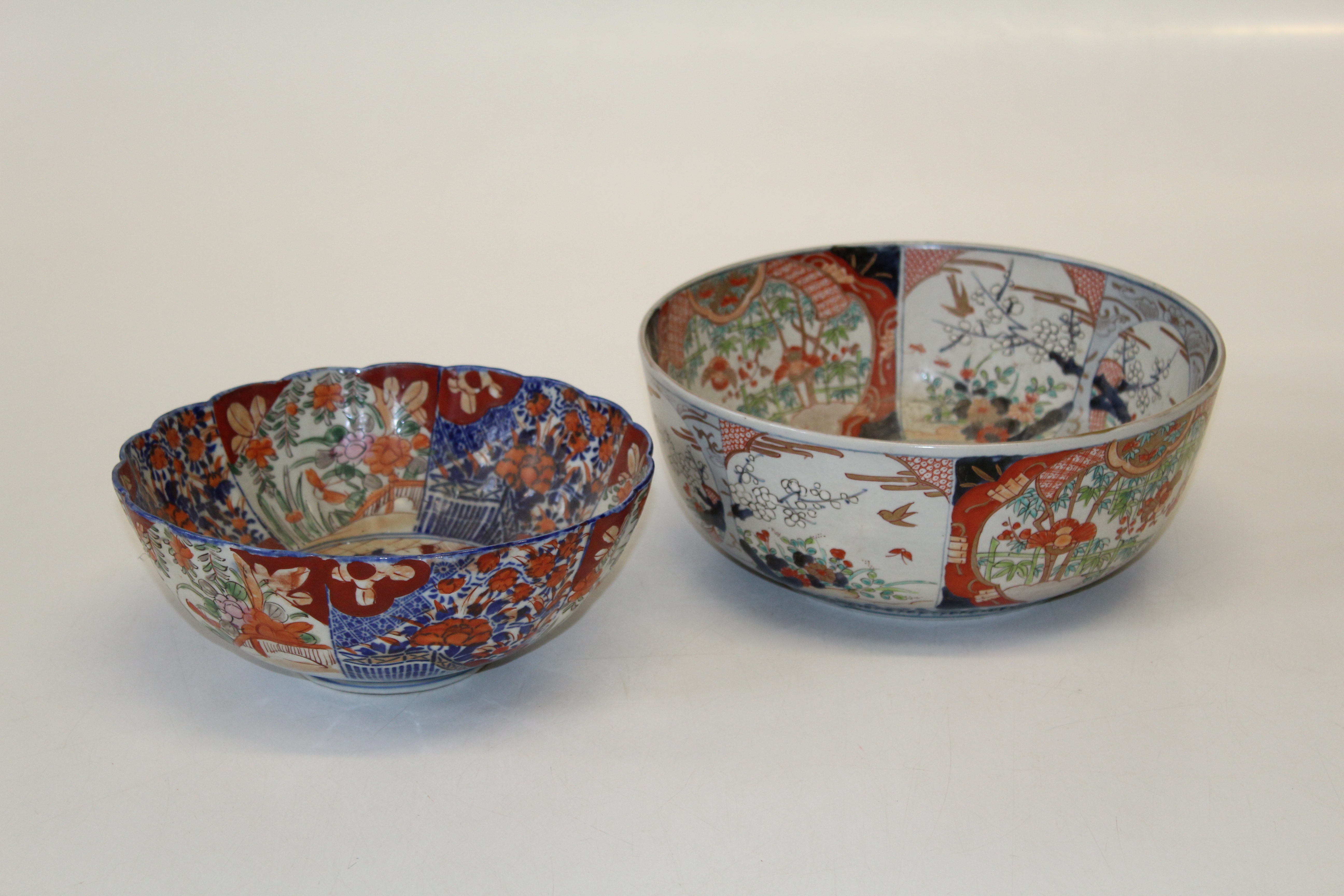 Two Japanese Imari bowls, early 20th century, one of lobed form, the other large and deep, decorated