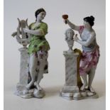 Two 19th century Dresden porcelain figures, each in the form of a female figure stood next to a