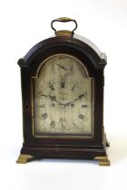 A George III ebonised and brass mounted table clock by John Holmes, London, late 18th century, the