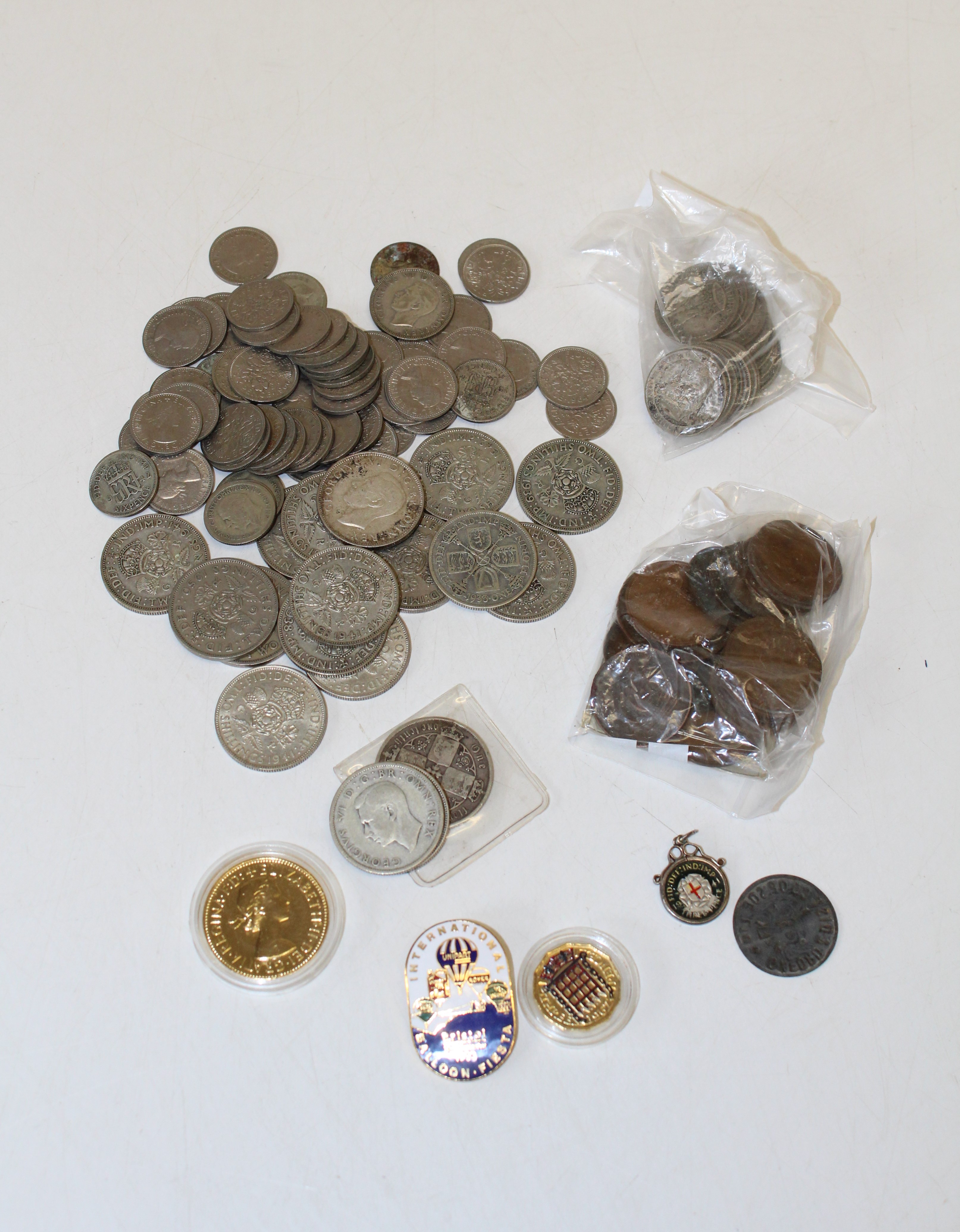 One bag George VI Florins various dates plus one Queen Victoria Gothic Florin One bag of sixpences
