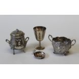 Assorted silver items, comprising a continental twin handled lidded bowl, with elaborate repousse