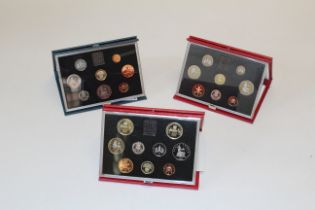 Deluxe packs of Proof Coin1984 1989 1990 plus a bag of commemorative crowns