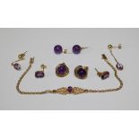 A collection of Amethyst and 14k gold jewellery comprising a bracelet set with an oval amethyst (