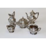 A late 19th century German .800 standard silver five piece tea and coffee service. Comprising tea