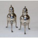 A pair of stem legged Tiffany & Co pepperettes. Stamped sterling to the base. Total weight