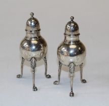A pair of stem legged Tiffany & Co pepperettes. Stamped sterling to the base. Total weight