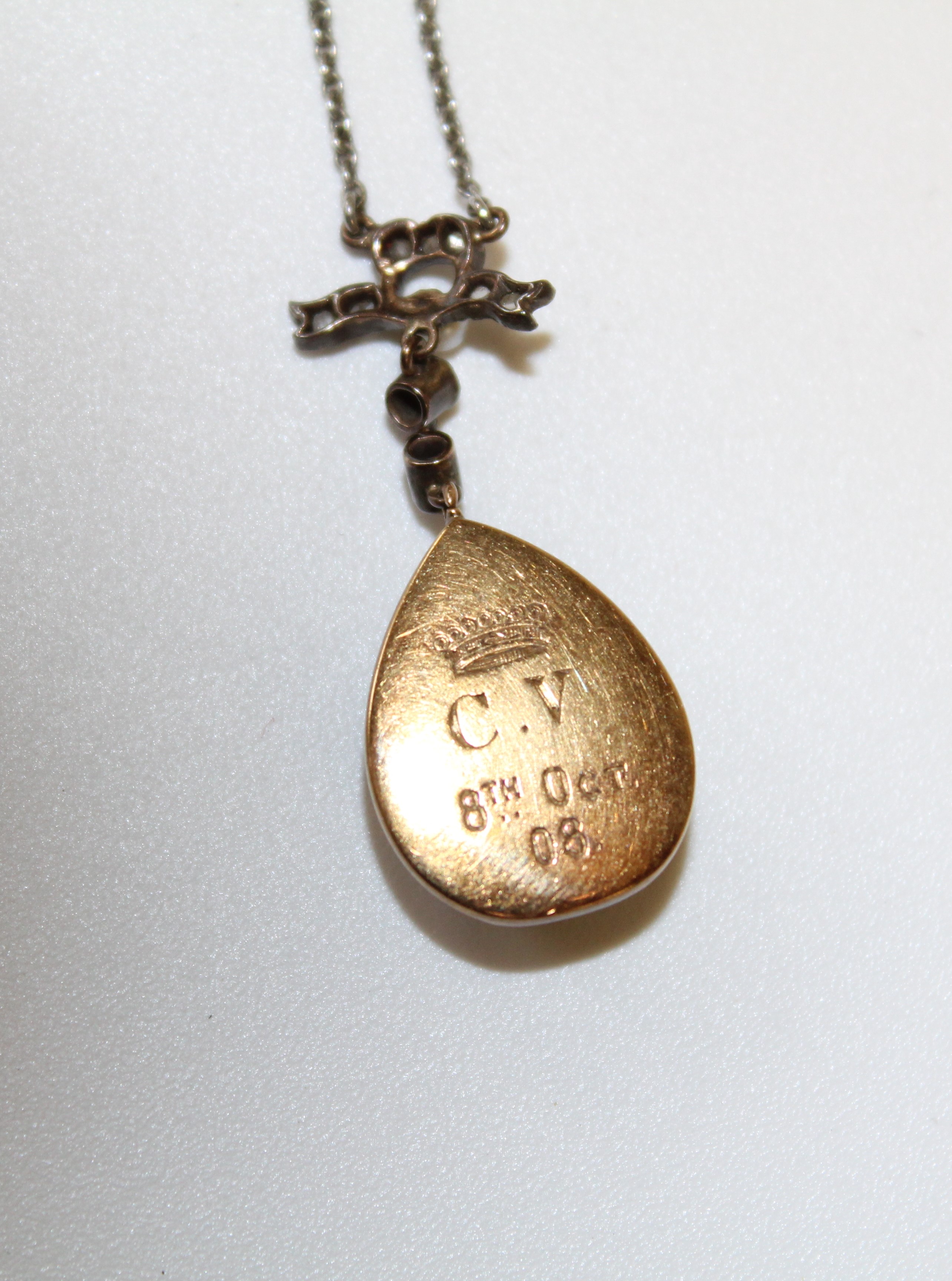 A garnet, cultured pearl and rose cut diamond set pendant. In closed back yellow precious metal - Image 2 of 2