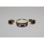 A Victorian 18ct gold and diamond and sapphire half hoop ring. Marked for Birmingham, size L. Set