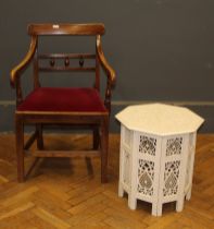 An early 19th century elm elbow chair raised on square section legs and a painted hardwood and