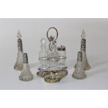Four early 20th century silver mounted scent bottles of conical form ( two lacking stoppers), 19cm