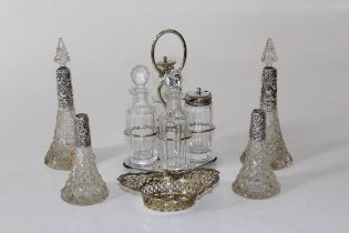 Four early 20th century silver mounted scent bottles of conical form ( two lacking stoppers), 19cm