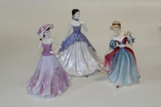 A Royal Doulton figure of The Year 1991-Amy, HN3316, together with a Coalport figure of The Year