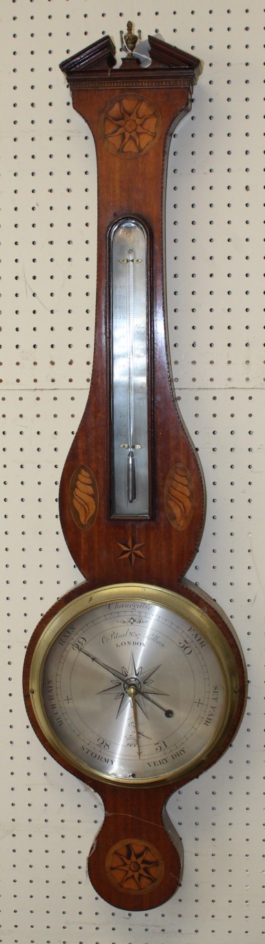 A George III inlaid and chequer strung mahogany banjo barometer, the broken arch surmount centred